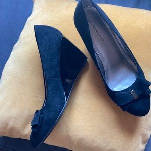 Beautiful black velvety black wedge shoe,  by Bandolino, never worn, size 8.